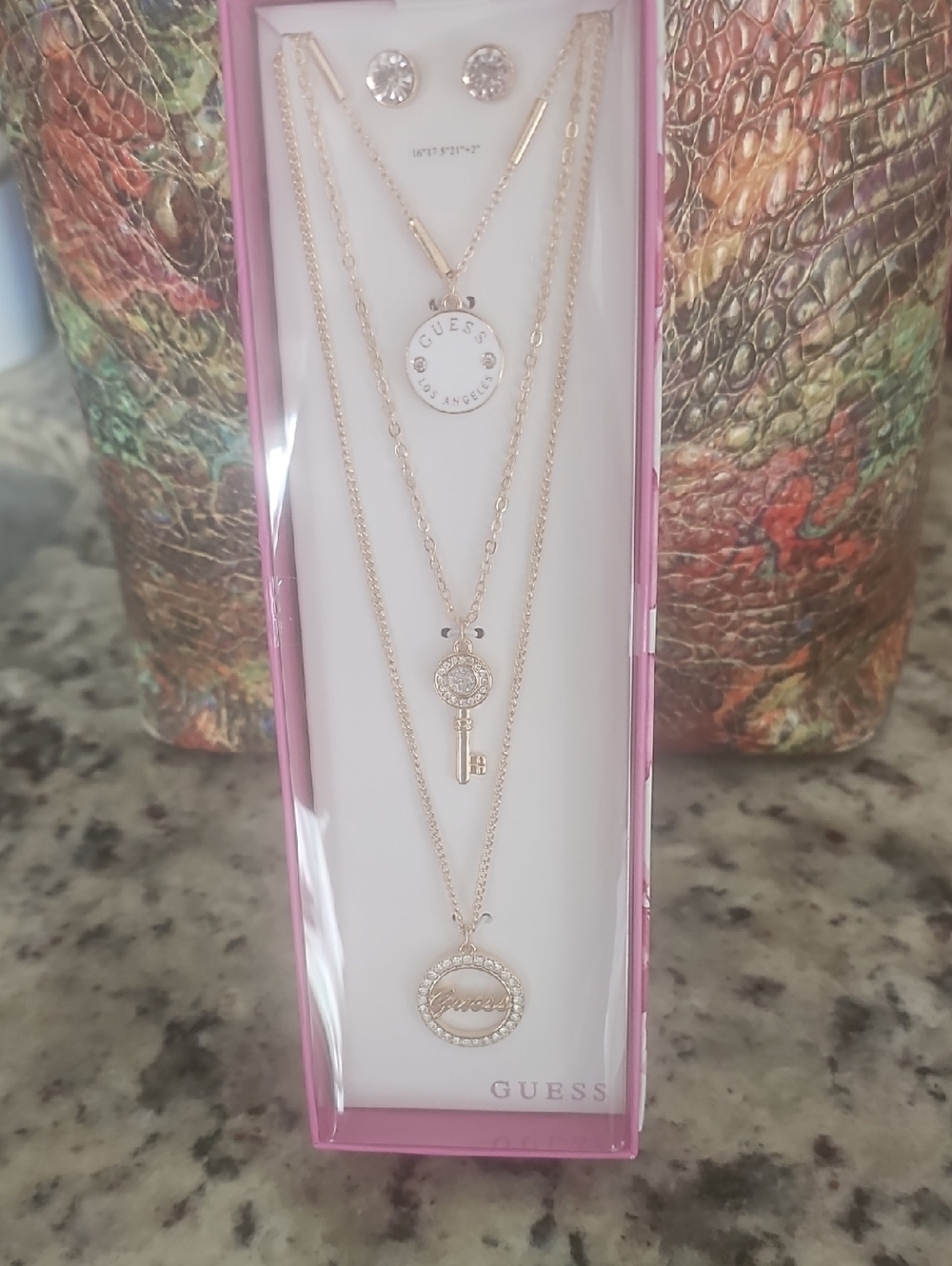 GUESS Gold Layered Pendant Necklace Set with Key and Coin Charms And Earrings